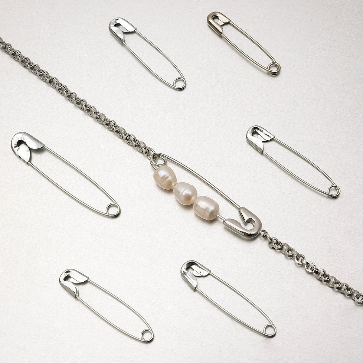 18K Gold and Silver Starry Bow Pendant Pearl Safety Pin Chain Layered Necklace Set