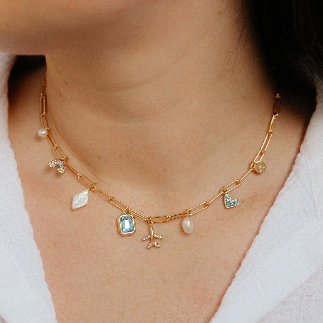 Charm Necklace Guide: How to Tell Your Story in Gold