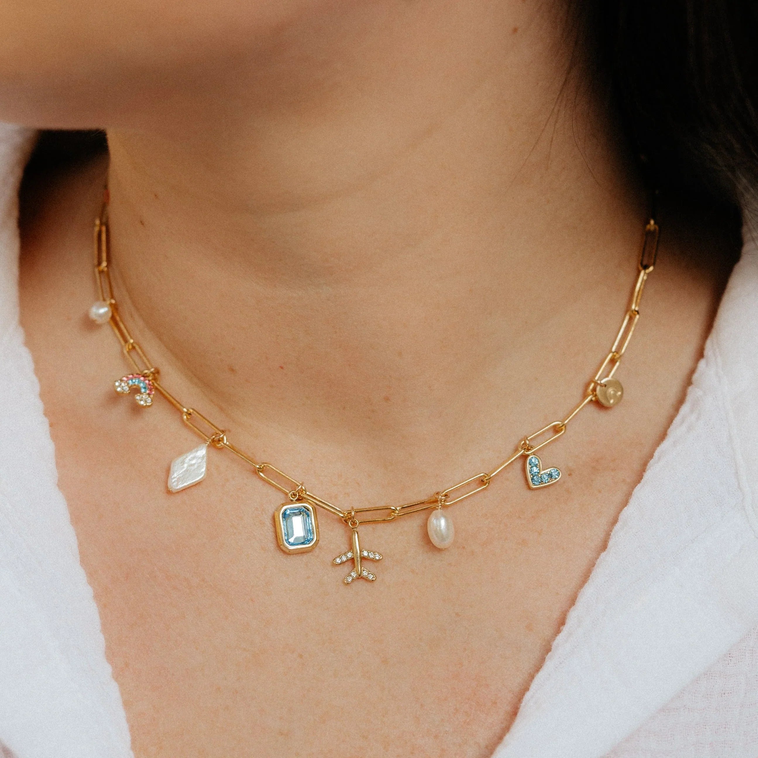 Charm Necklace Guide: How to Tell Your Story in Gold