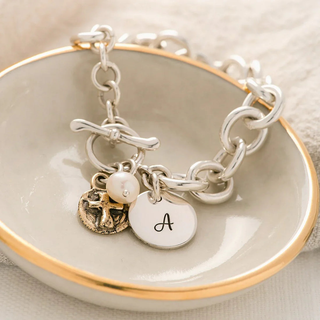 Sterling Silver Charm Bracelet: Jewelry Staple