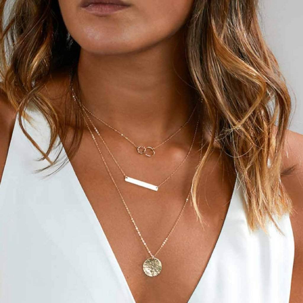 How to Wear a Layered Silver Necklace: Style Guide