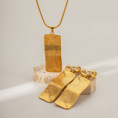 18K Gold Ribbed Plate Statement Huggie Earrings with Charm