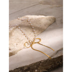 18K Gold Ribbon Bow Pearl Chain Pendant Necklace