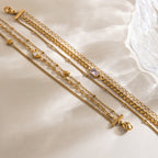 18K Gold Petite Joys Moon and Star Pink Jewel Dainty Three Chain Bracelet