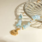 18K Gold Starfish Puka Shell Necklace