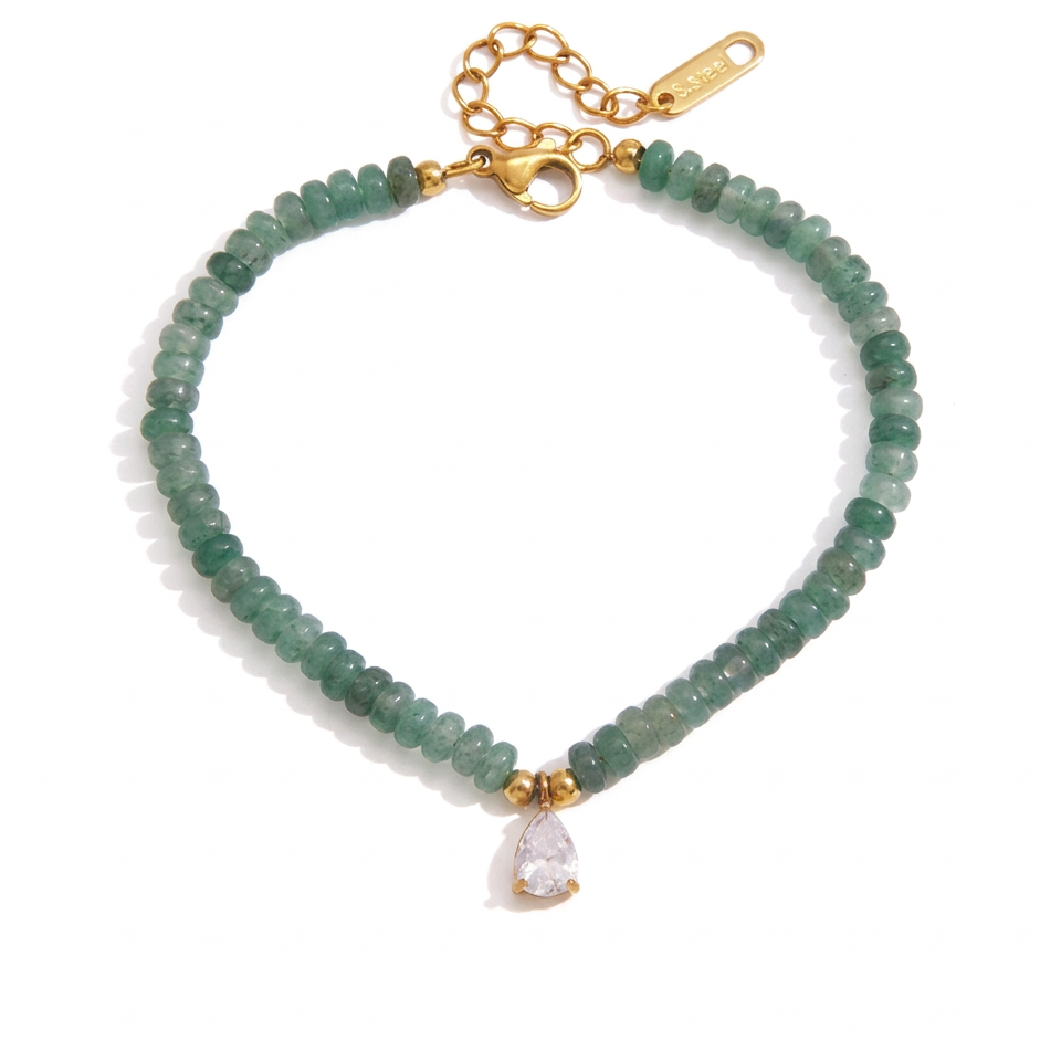 A green beaded bracelet with gold-tone hardware and a clear teardrop crystal charm, shown on a white background.