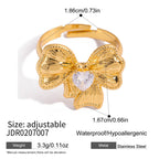 18K Gold Ribboned Elegance Bow Heart Statement Ring