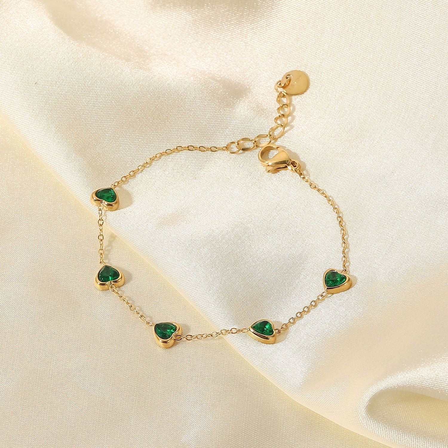 18K Gold Emerald Hearts Bracelet