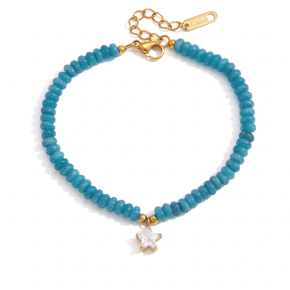 Blue beaded bracelet with a gold-tone clasp and a small white star charm, shown on a white background.