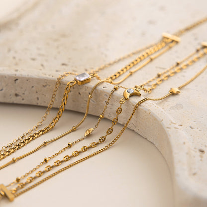 18K Gold Petite Joys Moon and Star Pink Jewel Dainty Three Chain Bracelet