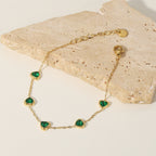 18K Gold Emerald Hearts Bracelet